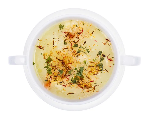 Sopa de legumes com açafrão em tigela branca — Fotografia de Stock