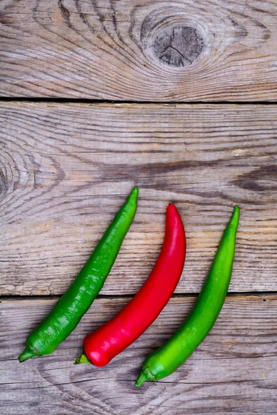 Hot pepper on wooden table