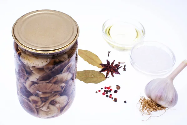 Marinated mushrooms in glass jar on white background — Stock Photo, Image