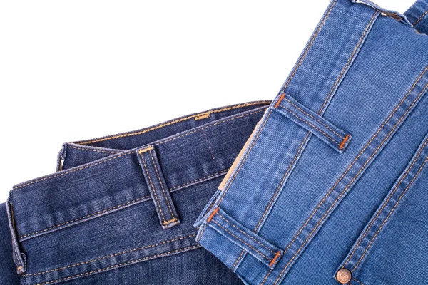 Сині джинси на білому тлі — стокове фото