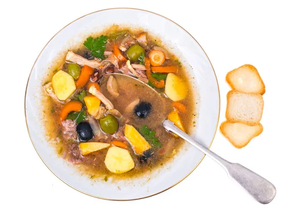 Vegetable soup with meat and olives — Stock Photo, Image