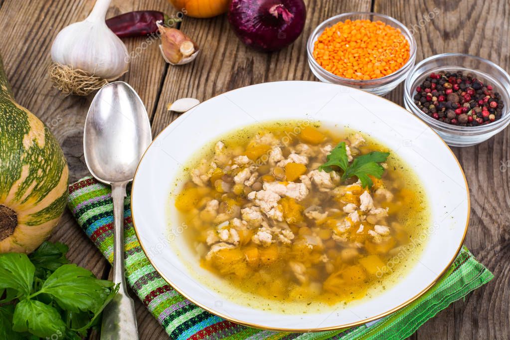 Spicy chicken soup with lentils and pumpkin