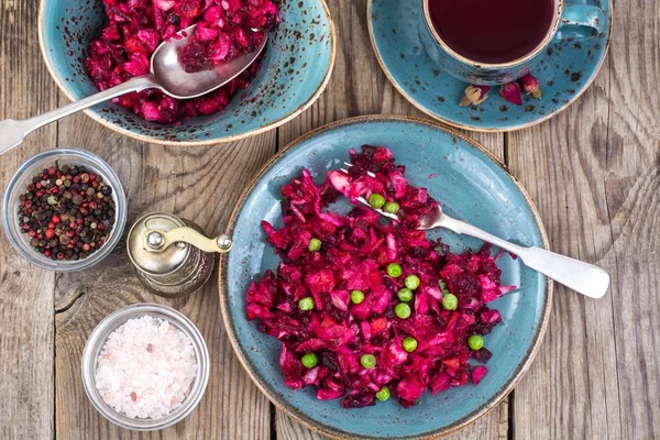 Vinaigrette salad with beets, potatoes, carrots and peas — Stock Photo, Image