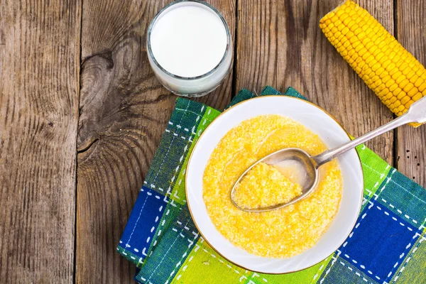 Dietary corn porridge on wooden table — Stock Photo, Image