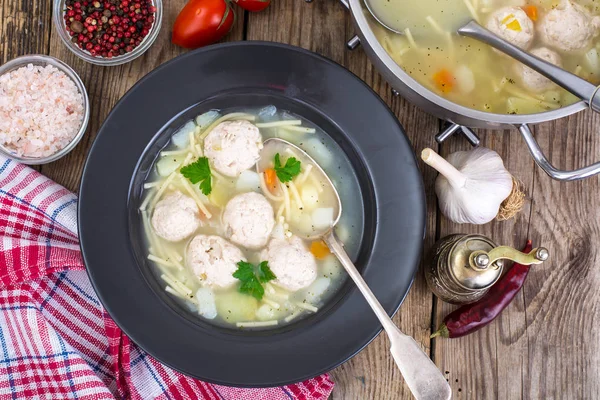 Chicken soup with vermicelli and meatballs — Stock Photo, Image