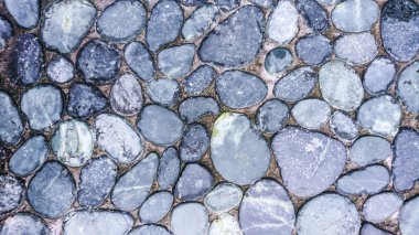 Küçük yuvarlak gri arka plan doku, taşlar