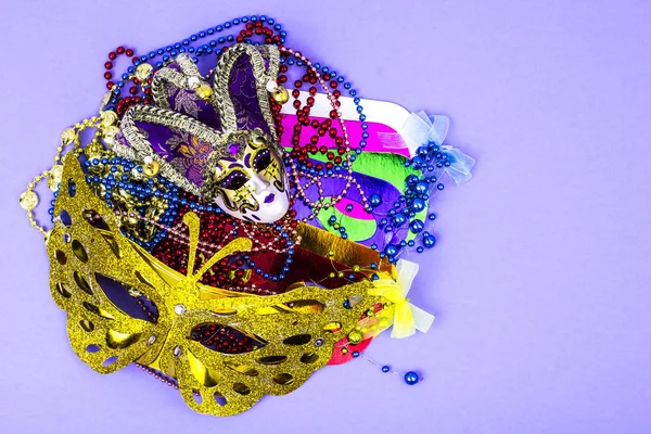 Celebration of mardi gras. Venetian, carnival, masquerade mask, beads — Stock Photo, Image