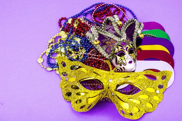 Celebration of mardi gras. Venetian, carnival, masquerade mask, beads — Stock Photo, Image