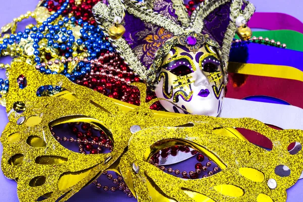 Celebration of mardi gras. Venetian, carnival, masquerade mask, beads — Stock Photo, Image