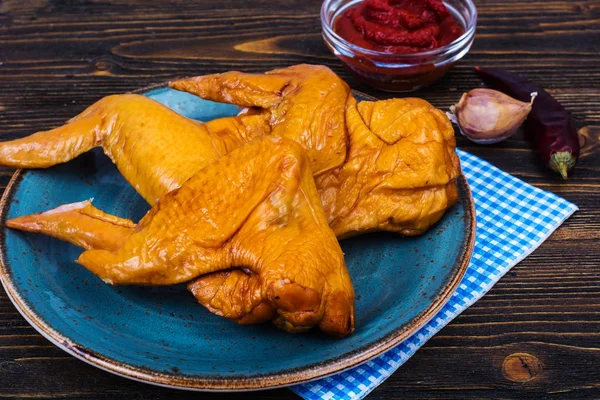Plate with smoked chicken wings — Stock Photo, Image