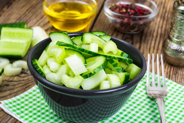 Fresh cucumber, stalks of celery for healthy food, diet menu Royalty Free Stock Photos