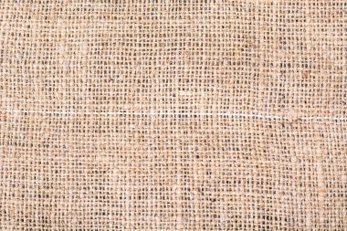 Ahşap masa üstünde çul doku