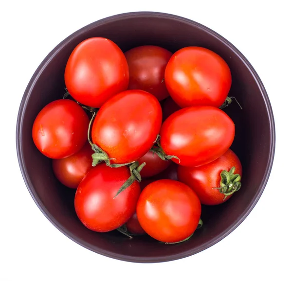 Small fresh tomatoes on plate — Stock Photo, Image