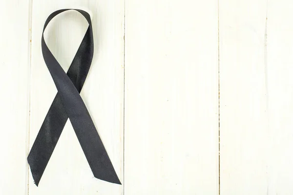Fita preta símbolo da luta contra melanoma e cancro de pele — Fotografia de Stock
