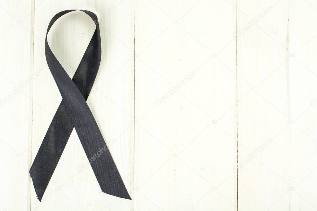 Black ribbon-symbol of fight against melanoma and skin cancer