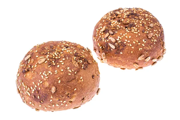 Round whole-wheat rye rolls with flax and sunflower seeds — Stock Photo, Image