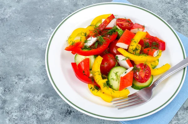 Crab sticks salad with fresh vegetables — Stock Photo, Image