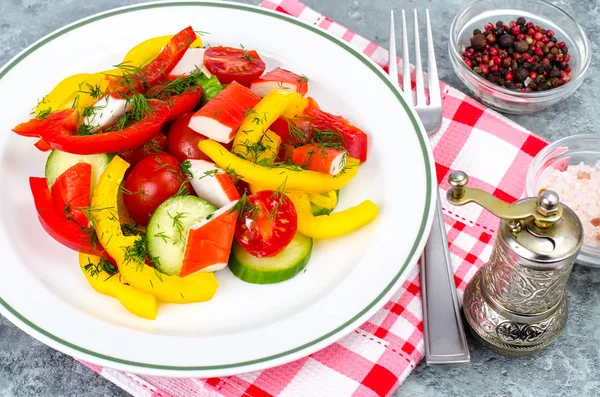 Crab sticks salad with fresh vegetables — Stock Photo, Image