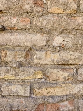 Eski bir tuğla duvar parçası. Geçmişi, tuğla dokusu. Stüdyo Fotoğrafı