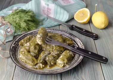 Dolmas in egg-lemon sauce  clipart