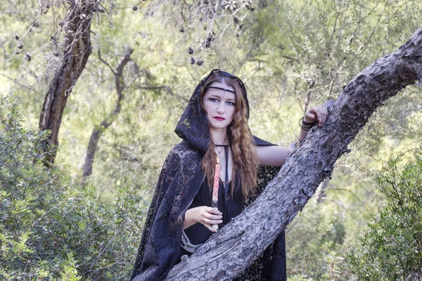 Witch women during Halloween in the forest — Stock Photo, Image