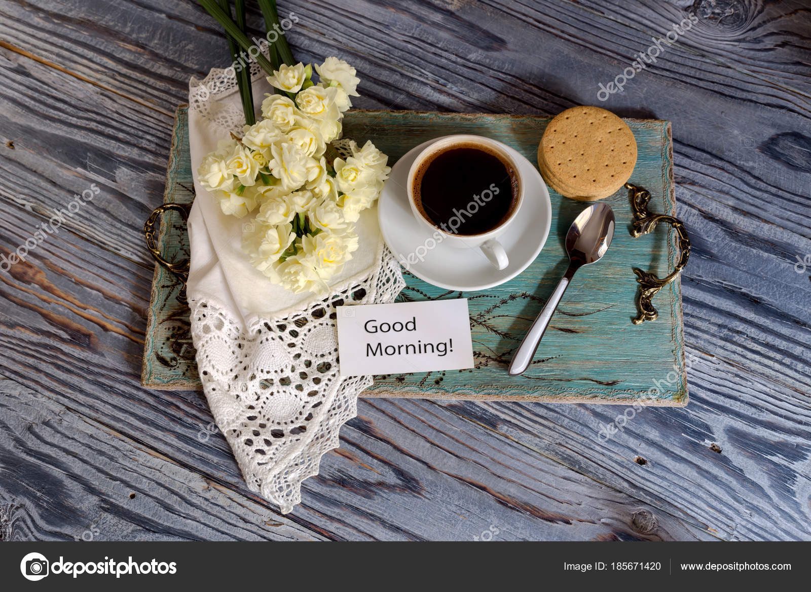 A Cup With Morning Coffee And A Bouquet Of Flowers Stock Photo