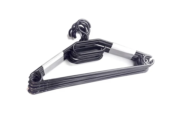 The black hangers (set) for the closet close-up — Stock Photo, Image