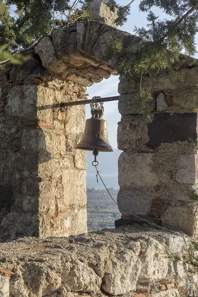 View of the bell of a Christian church in the mountains