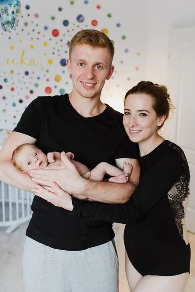 Young Parents Hold Newborn Arms Look Camera Smile — Stock Photo, Image