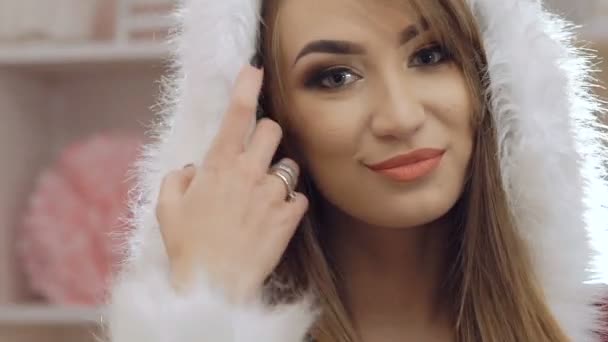 Portrait of happy woman dressed in glamour snow-maiden suit smiling to camera — Stock Video