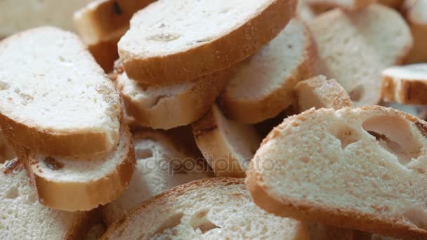 Close up of many fresh toasts with raisins — Stock Video