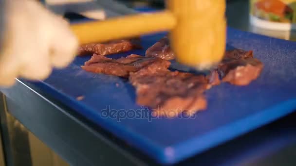 Master chief cooking meat chops 4K — Stock Video