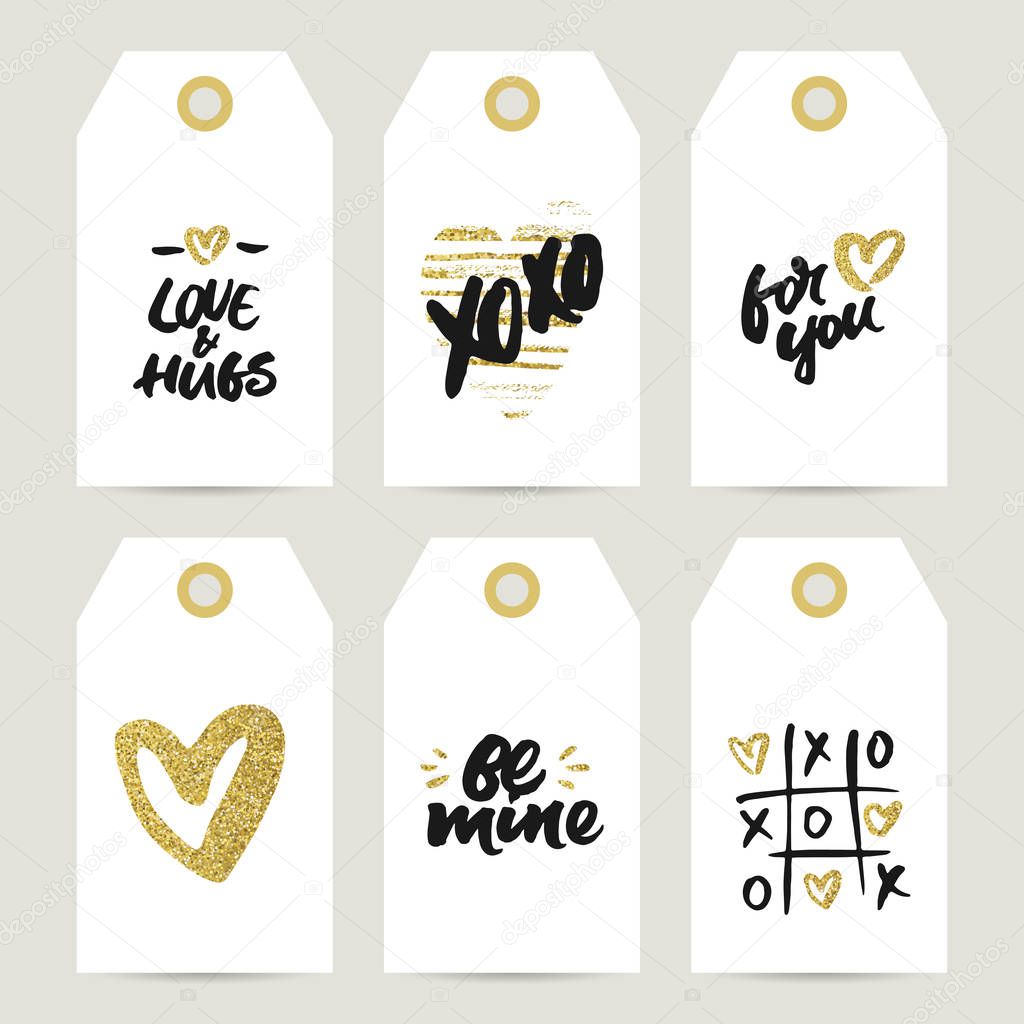 Gift tags with rough handwritten brush lettering and golden hear