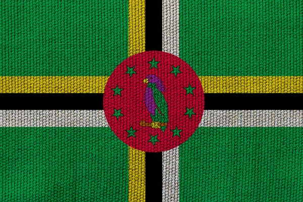 Dominica Flagge Auf Dem Hintergrund Textur Konzept Für Designerlösungen — Stockfoto