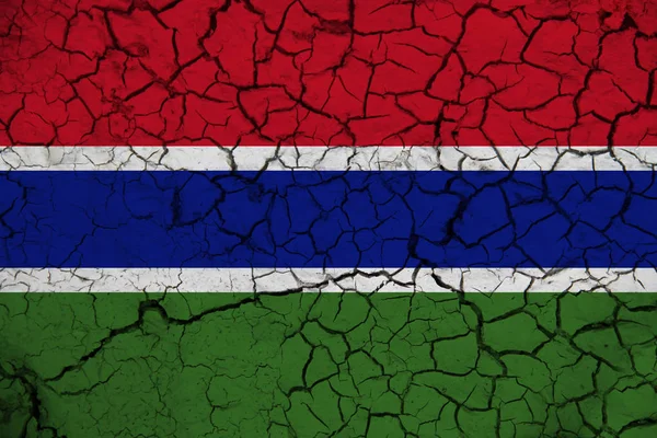 Gambia flag on the background texture. Concept for designer solutions.