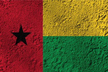 Arka planda Gine Bissau bayrağı var. Tasarımcı çözümleri kavramı.