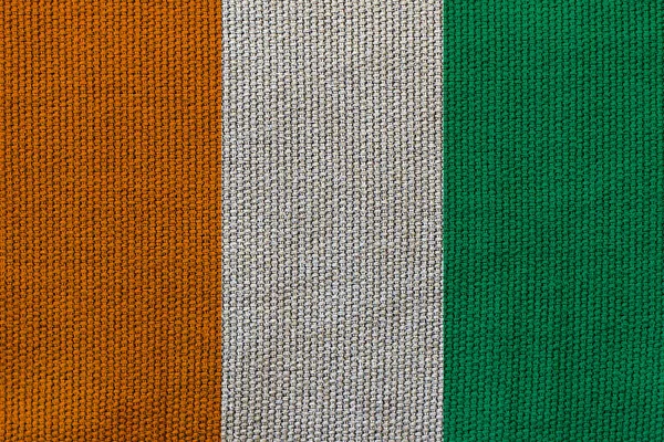 Ireland flag on the background texture. Concept for designer solutions.