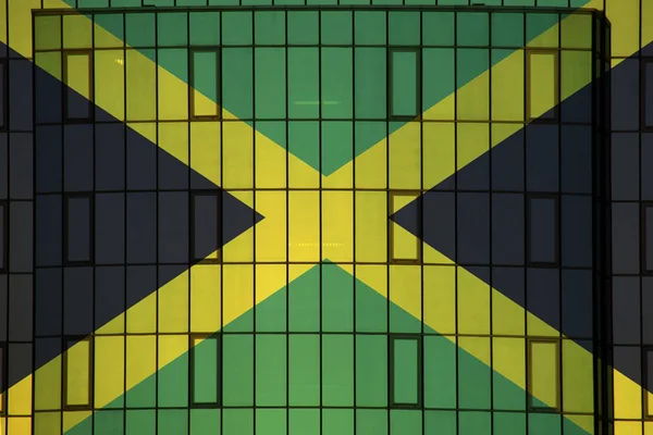 背景纹理上的牙买加国旗 设计者解决方案的概念 — 图库照片