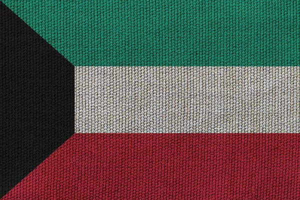 kuwait flag on the background texture. Concept for designer solutions.