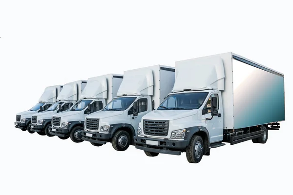 Cinco Camioneros Blancos Estacionamiento Están Esperando Próxima Entrega Mercancías Concepto — Foto de Stock