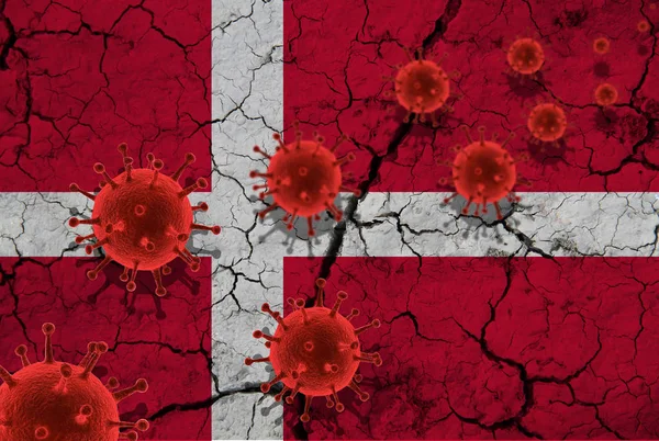 Red virus cells, pandemic influenza virus epidemic infection, coronavirus, Asian flu concept, against the background of a cracked Denmark flag