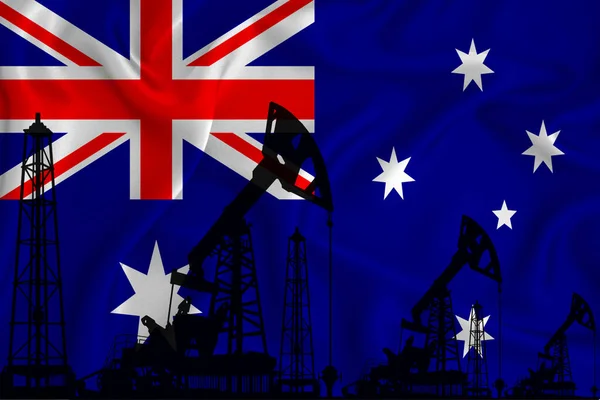 Silhouette of drilling rigs and oil derricks on the background of the flag of Australia. Oil and gas industry. The concept of oil fields and oil companies.