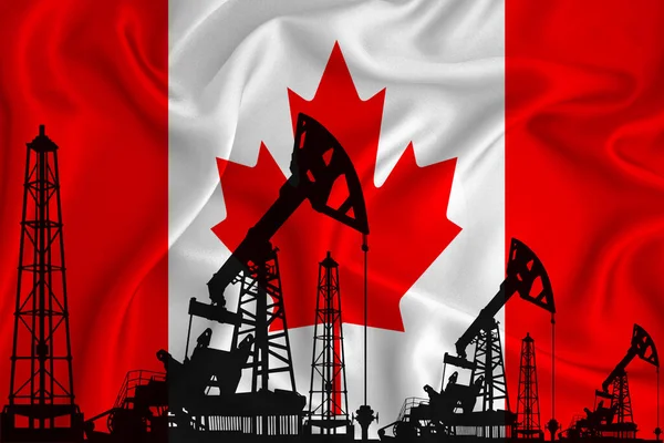 Silhouette of drilling rigs and oil derricks on the background of the flag of canada. Oil and gas industry. The concept of oil fields and oil companies.