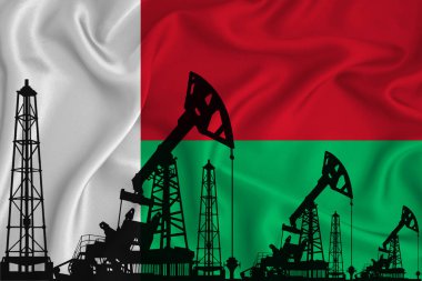 Madagaskar Bayrağı Geliştiriliyor. Bayrak arka planında sondaj kulesi ve petrol kulesi silueti. Petrol ve gaz endüstrisi. Petrol alanları, gaz ve petrol şirketleri kavramı. 3B görüntüleme.