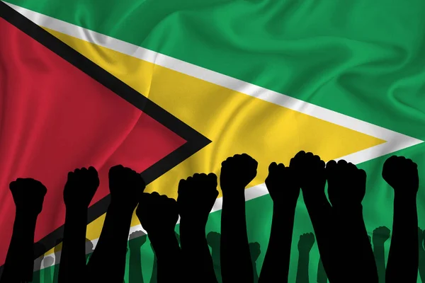 Guyana Bayrağının Arka Planında Kaldırılmış Kolların Silueti Sıkılmış Yumruklar Güç — Stok fotoğraf