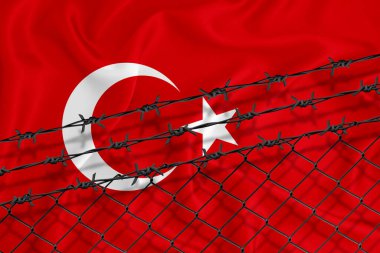 Hindi bayrakları, tel örgüler ve dikenli teller geliştiriyoruz. Göçmen izolasyonu kavramı. Metnin için yer.