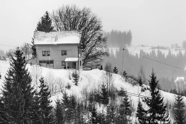 Snow-covered house — Stock Photo, Image