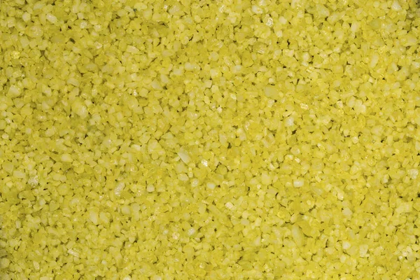 Background of yellow bath salts — Stock Photo, Image