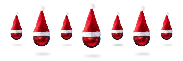 Boules rouges de Noël en chapeaux Santa Claus — Photo