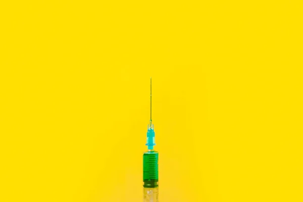 Green poison in a syringe — Stock Photo, Image